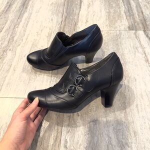 Black Pierre Dumas Flexibles Leather Mid Heel Pumps w/ Buckle Detailing